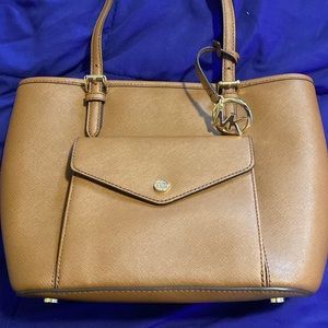 Michael Kors textured medium size towed bag brown